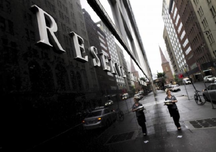 Australia cuts interest rates to turn back global deflation tide